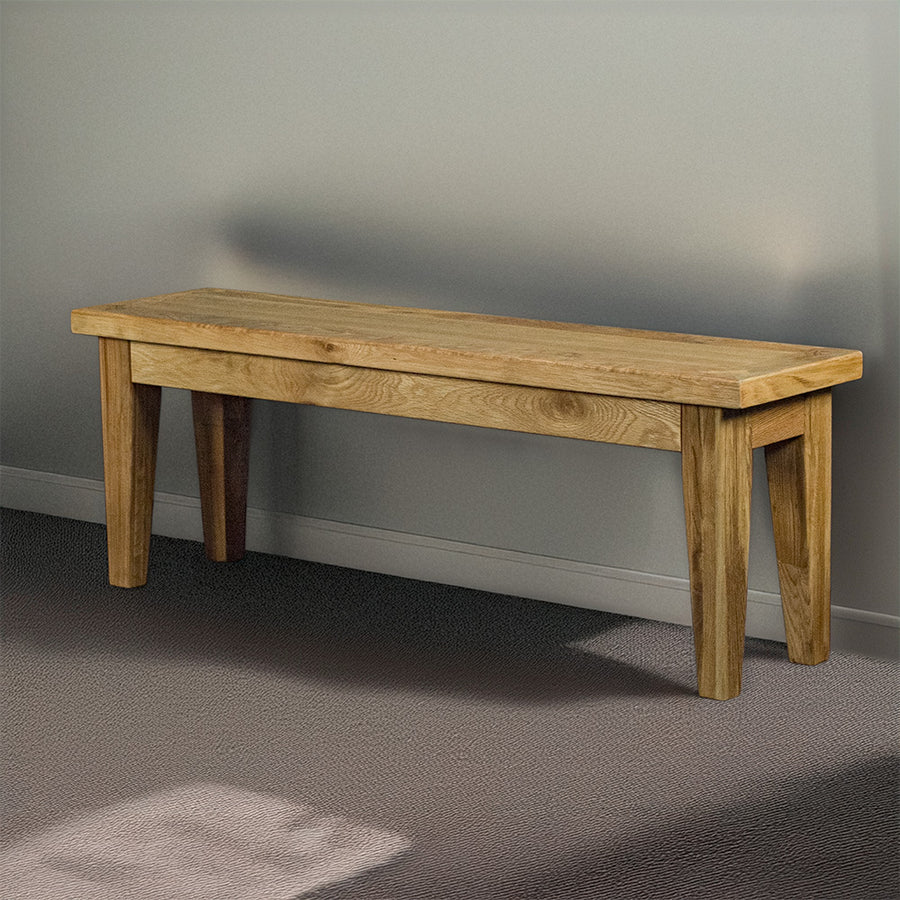 An overall view of the Oscar 1.4m Oak Bench Seat.