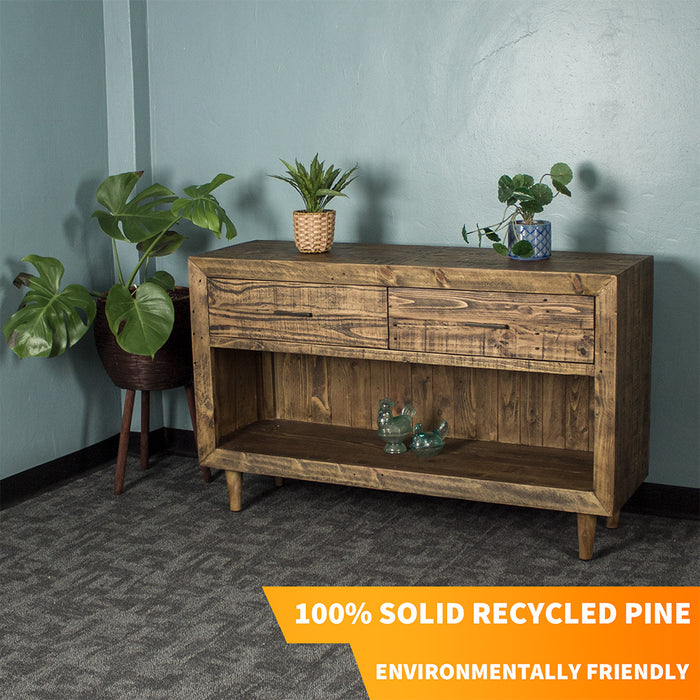 Paddington Recycled Pine Buffet / Hall Table front view. There are two potted plants on the top and two glass ornaments on the lower shelf.