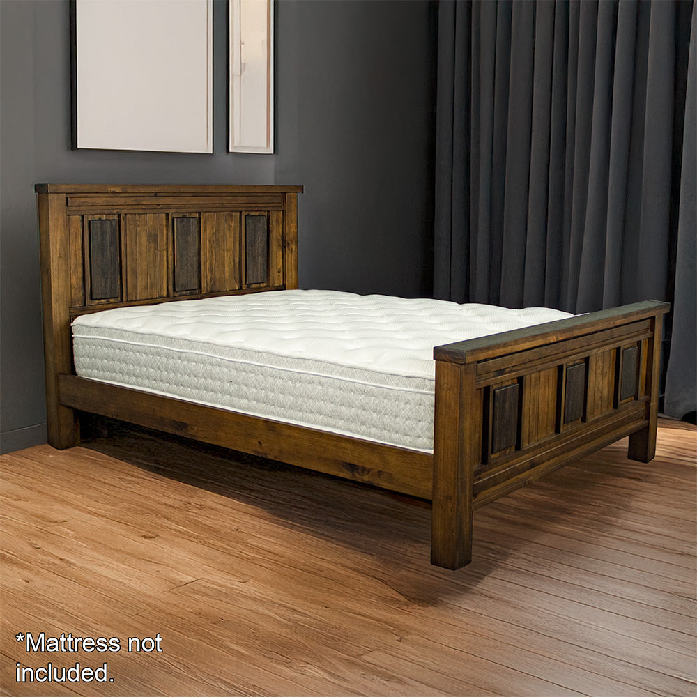 The front of the Botanica Queen Slat Bed Frame, with a mattress on top.