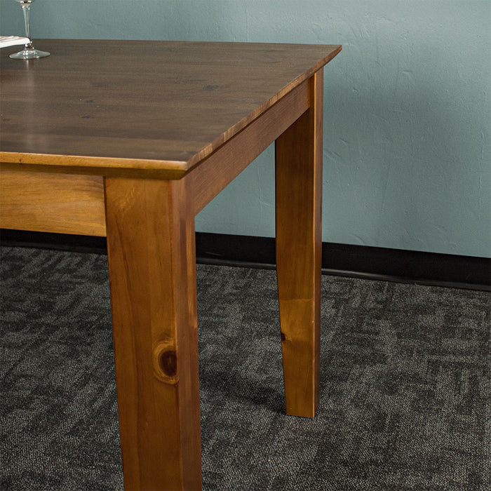 The side of the Hamilton Dining Table with Rimu Finish (1.8m)