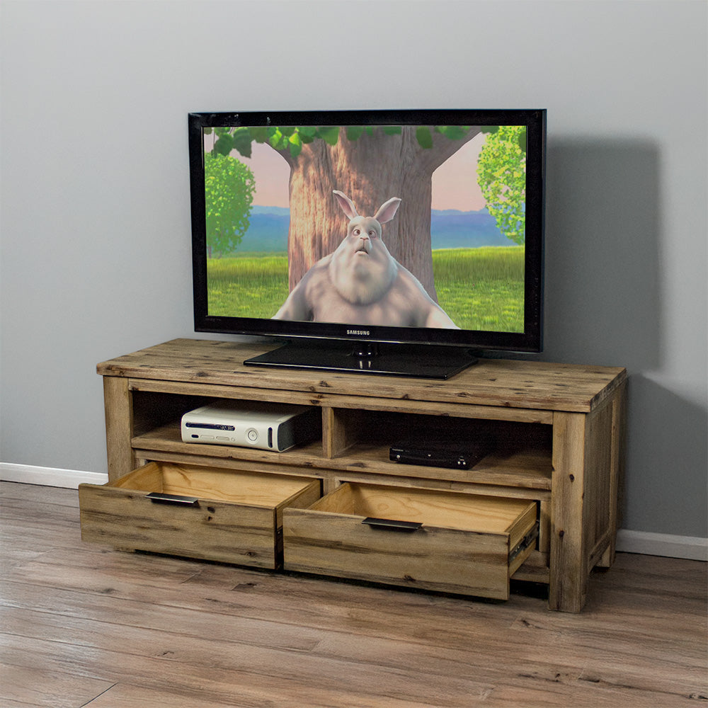 The front of the Mars Medium TV Unit with its drawers open. There is a TV on top, with a gaming console and a DVD player in the two shelves below.