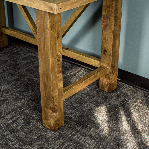 Closer view of the legs of the Ventura Recycled Pine Desk.