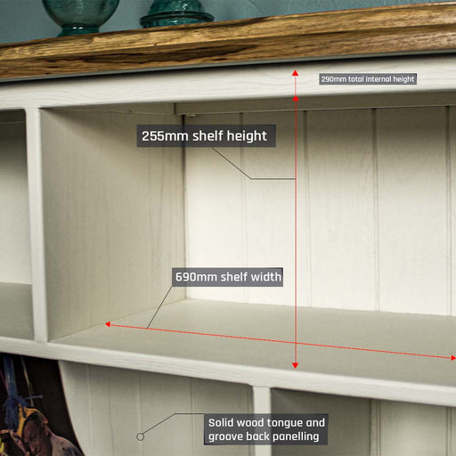 A closer up of the shelf inside the Versailles Outback Oak Bookshelf (Off White).