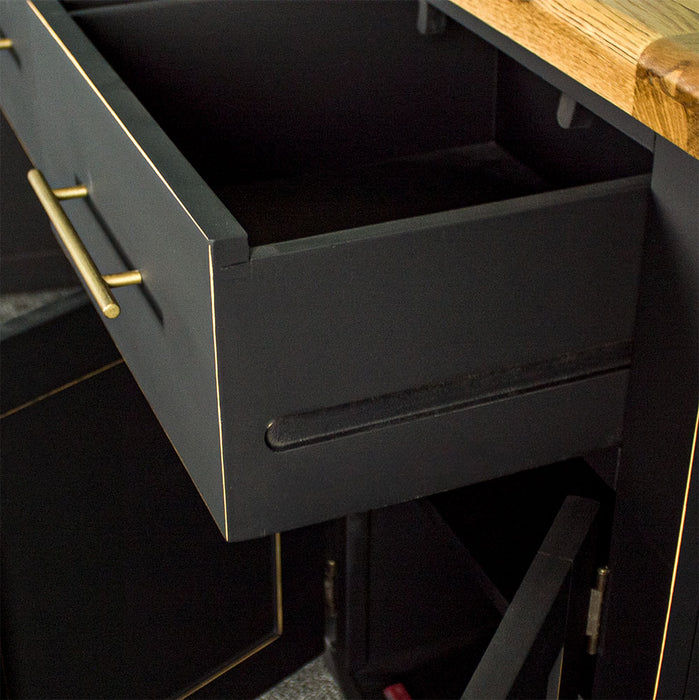 Close up of the side of the drawer of the Cascais Large Black Buffet which shows the free flowing runners.