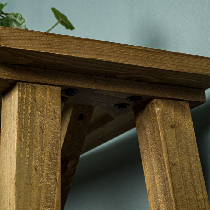 Close up of the secure bolts in the Ventura Recycled Pine Hall Table which connect the legs to the base.