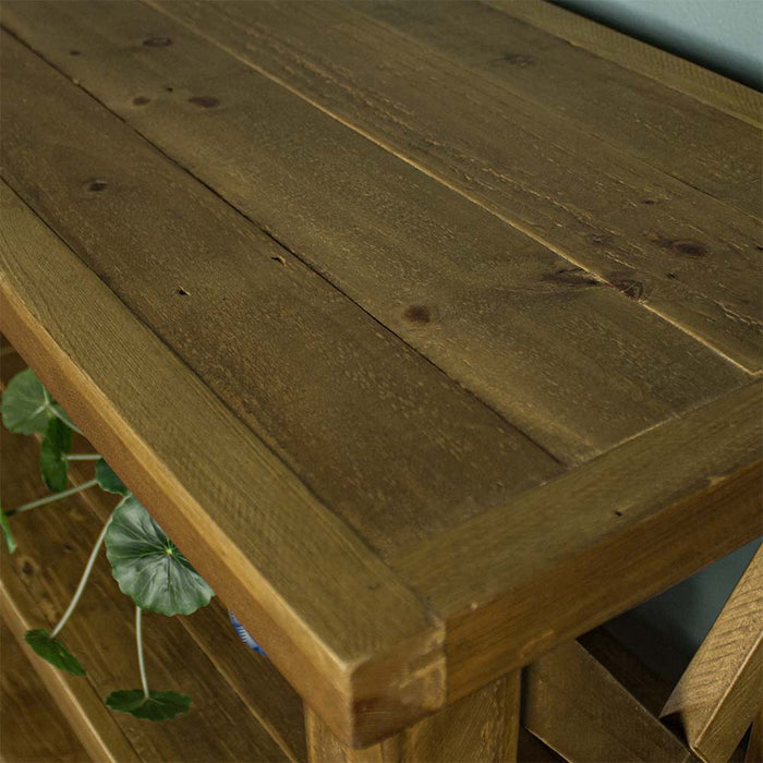 A close up of the top of the Ventura Recycled Pine Large Hall Table, showing the wood grain.