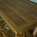 A close up of the top of the Ventura Recycled Pine Large Hall Table, showing the wood grain.
