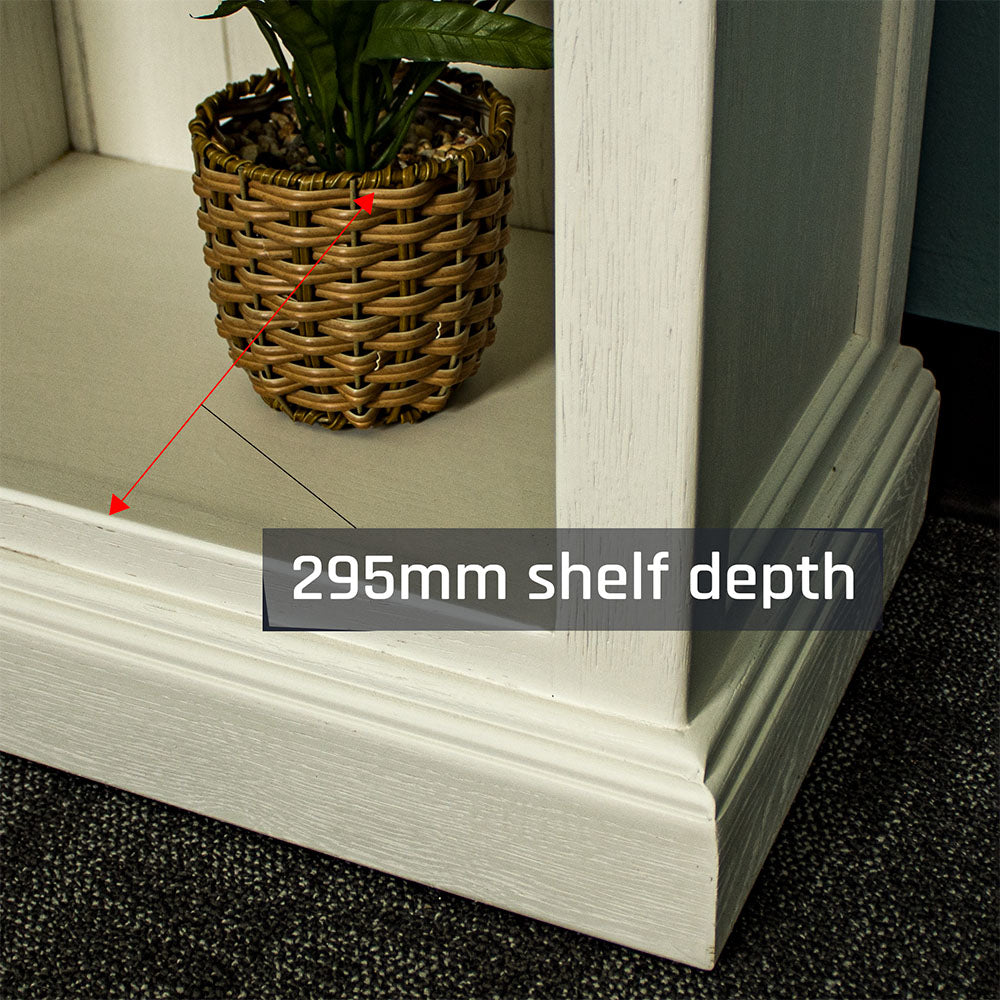 A close up of the corner of Versailles Outback Oak Bookshelf (Off White).