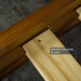 A close up of the slats on the Alton Rimu-stained NZ Pine Queen Bed Frame.