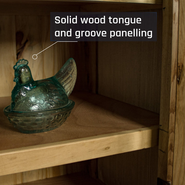 A view of above the shelf on the Yes Oak Display Cabinet. There is a blue glass ornament in the shape of a chicken on the shelf.