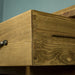 A close up of the dovetail joining on the drawer of the Ventura Recycled Pine Buffet
