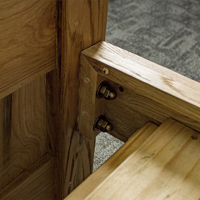 Another view of the strong bolts that connect the side rails to the footboard and headboard of the Amalfi Oak Queen Bed Frame.