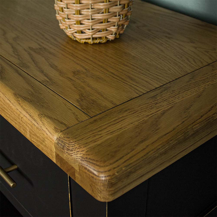 A close up of the top of the Cascais Large Buffet with Wine Rack, showing the wood grain and colour.
