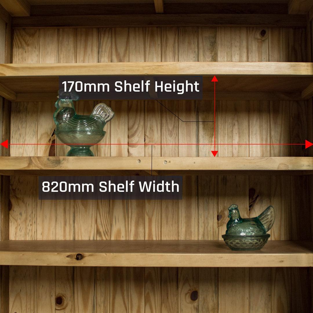 An overall view of the shelves on the Yes Oak Display Cabinet. There are two blue glass ornaments in the shape of a chicken on the two middle shelves.