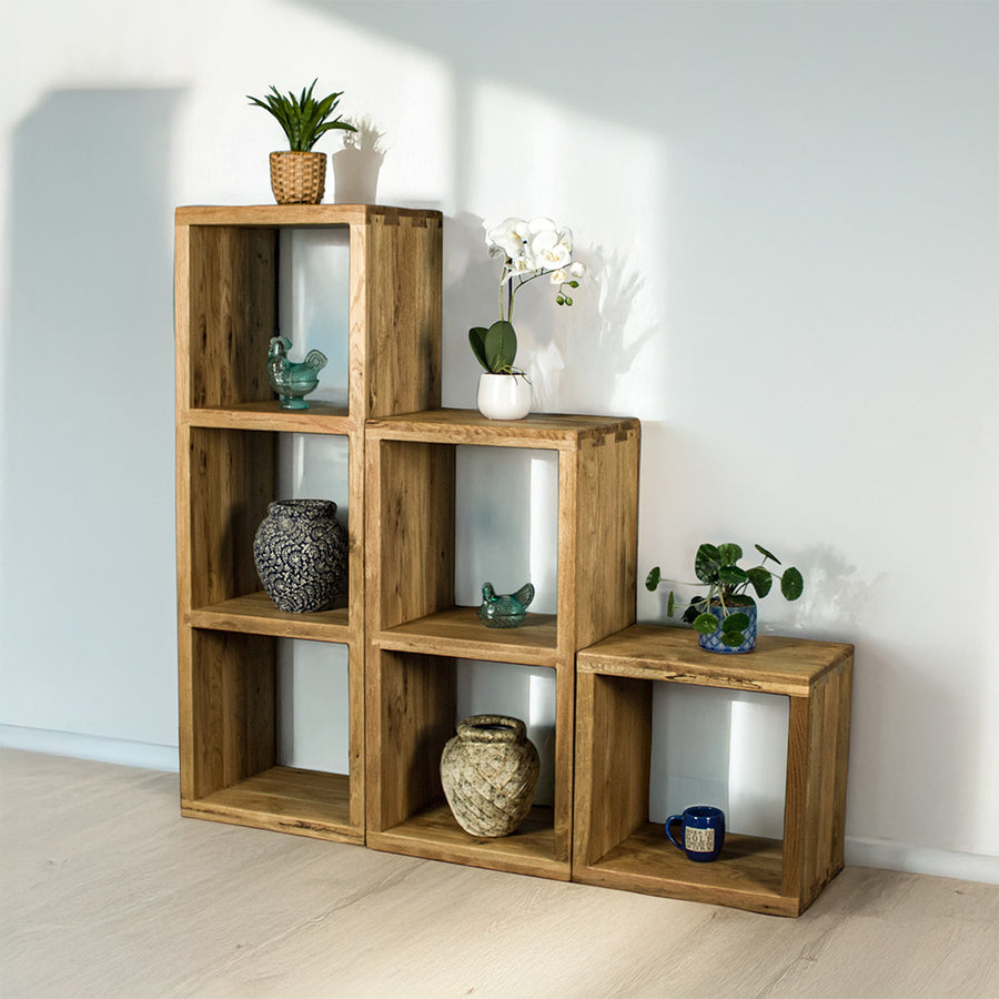 From left to right, the Vancouver Value Triple Cube Shelf, the Vancouver Value Double Cube Shelf and the Vancouver Value Single Cube Shelf. There are various plants, glass ornaments and vases on the shelves.