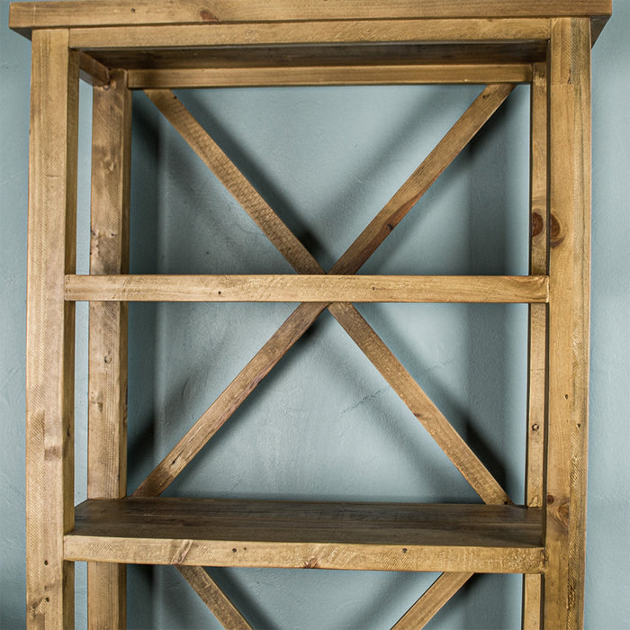 Front view of the Ventura Recycled Pine Bookcase, showing the shelving and the 'X' shaped braces at the back.