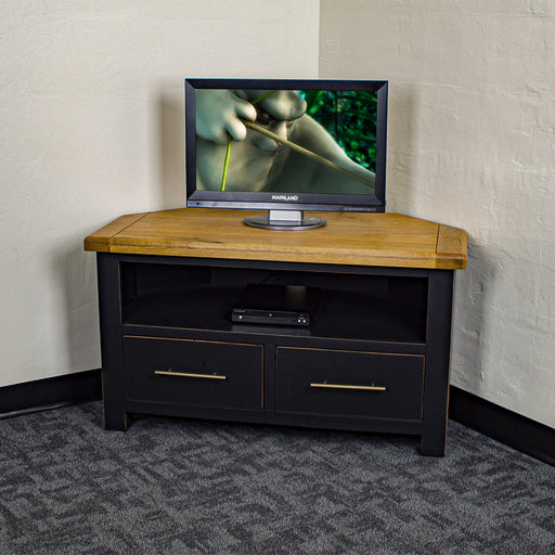 The front of the Cascais Oak-top Corner Entertainment Unit. There is a small TV on top. There is a DVD player in the middle of the shelf.