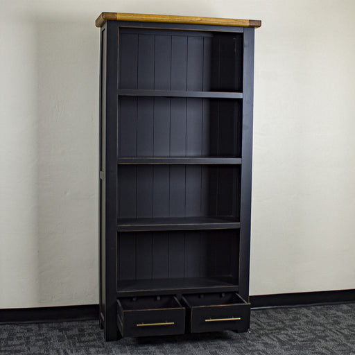 The front of the Cascais Large Bookcase with its drawers open.