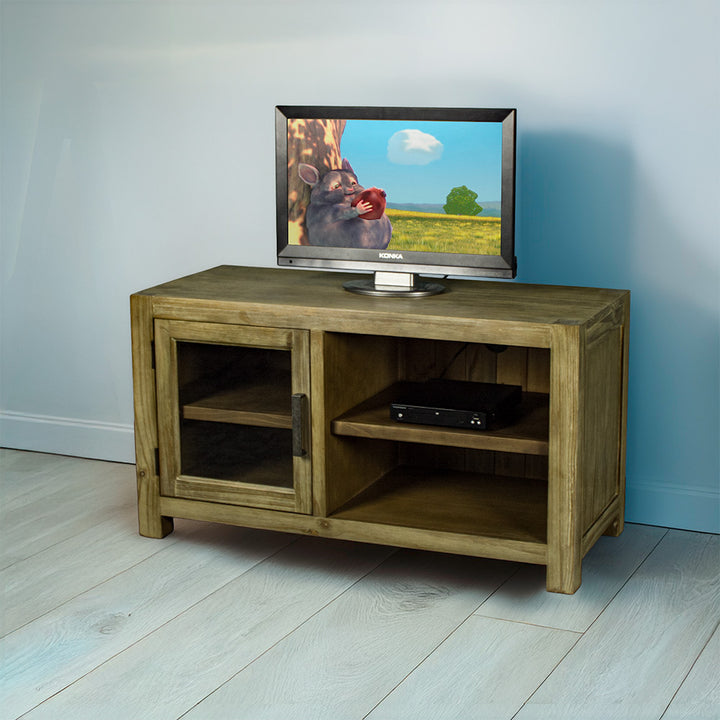 The front of the Vancouver NZ Pine Entertainment Unit / TV Unit. There is a small TV on top and a DVD player on the open shelf.
