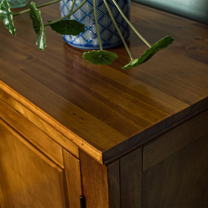 A close up of the top of the Montreal Midsize NZ Pine Buffet, showing the wood grain and colour.