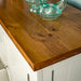 Close up of the rimu stained top of the Alton 2 Door 5 Drawer Buffet