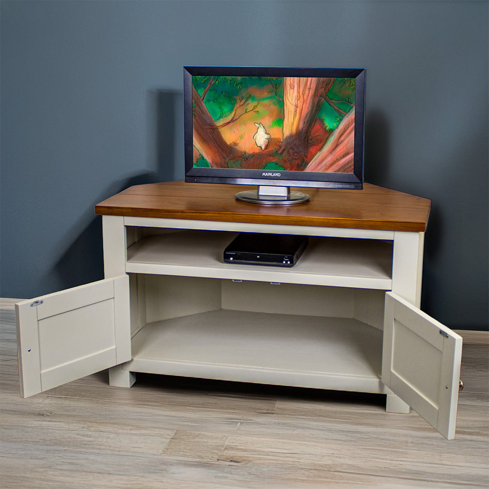 The Alton Corner TV Unit with its doors open. There is a small TV on top and a DVD player in the shelf.