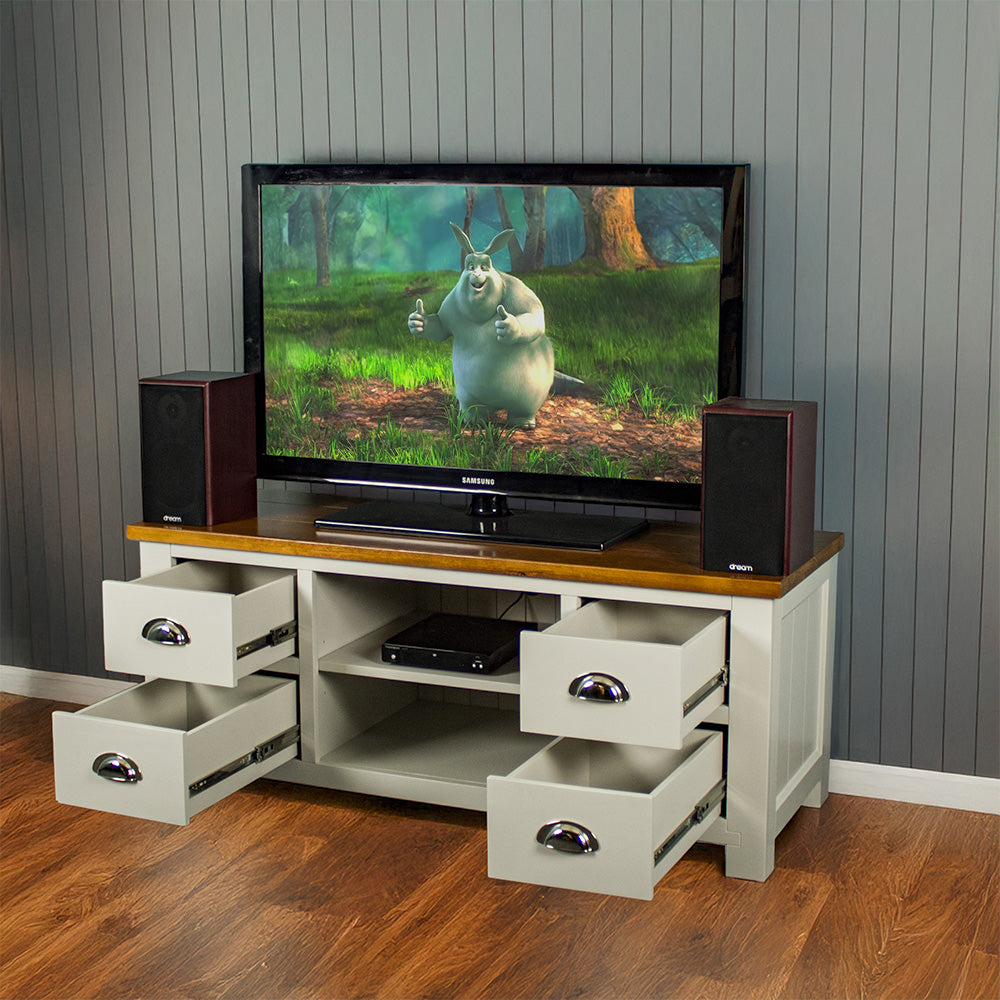 The front of the Alton Entertainment Unit with its drawers open. There are two speakers with a TV in between. There is a DVD player on the top shelf in the middle.