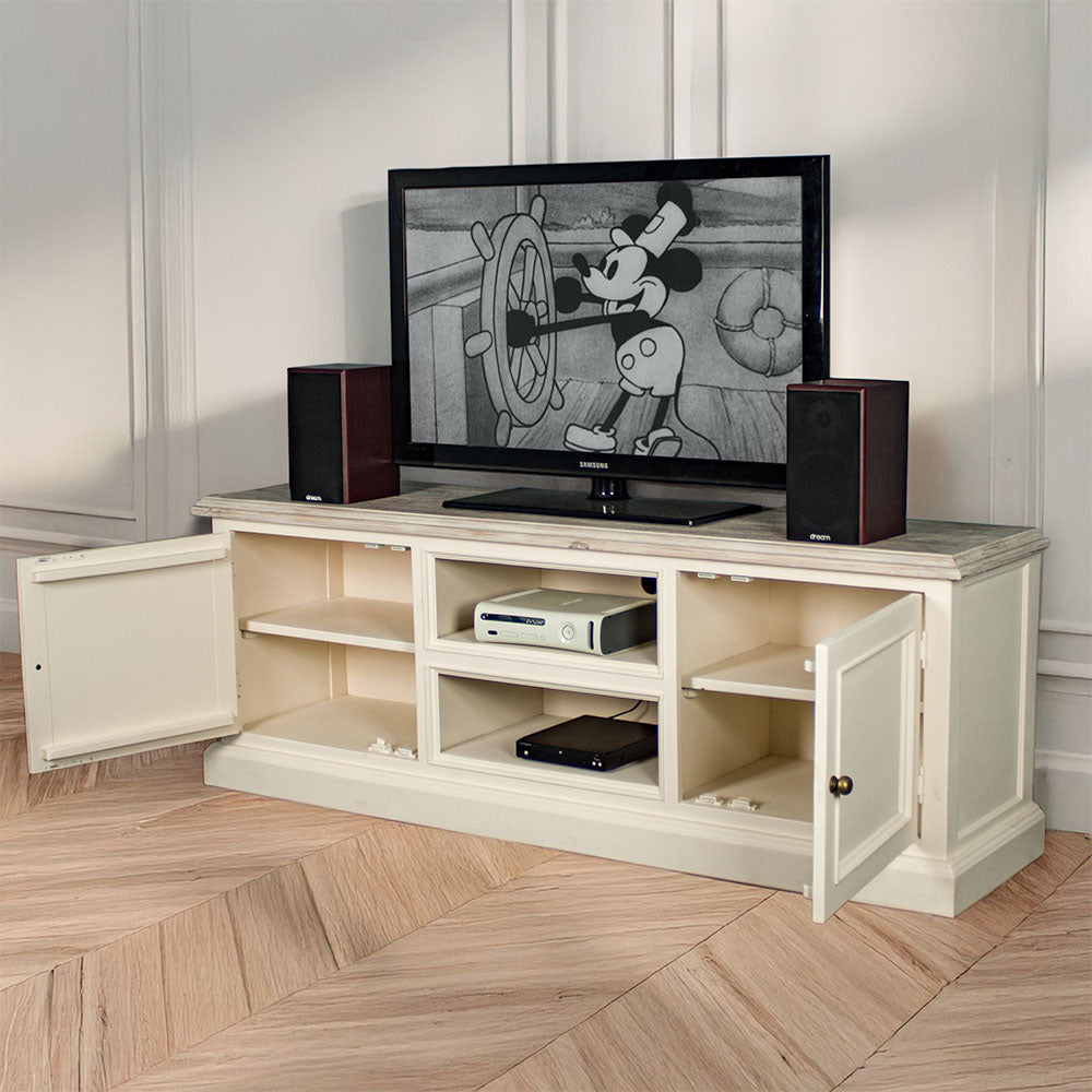 The front of the Biarritz Entertainment Unit with its doors open. There is a large TV on top with two speakers on either side. There is a game console and a DVD player on the top and bottom shelves.