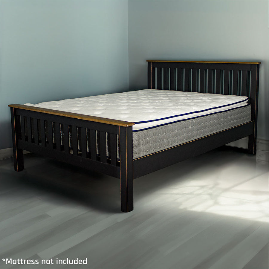 The front of the Cascais Oak Top Double Bed Frame with a mattress on top.