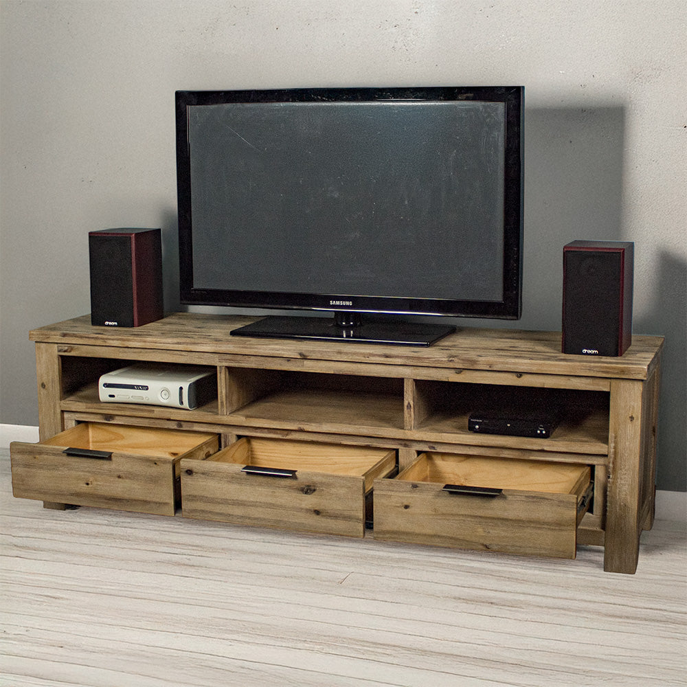 The front of the Mars 1.8m Large TV Unit with its drawers open. There is a TV on top with two speakers on either side. There is a gaming console on the left shelf and a DVD player on the right shelf.