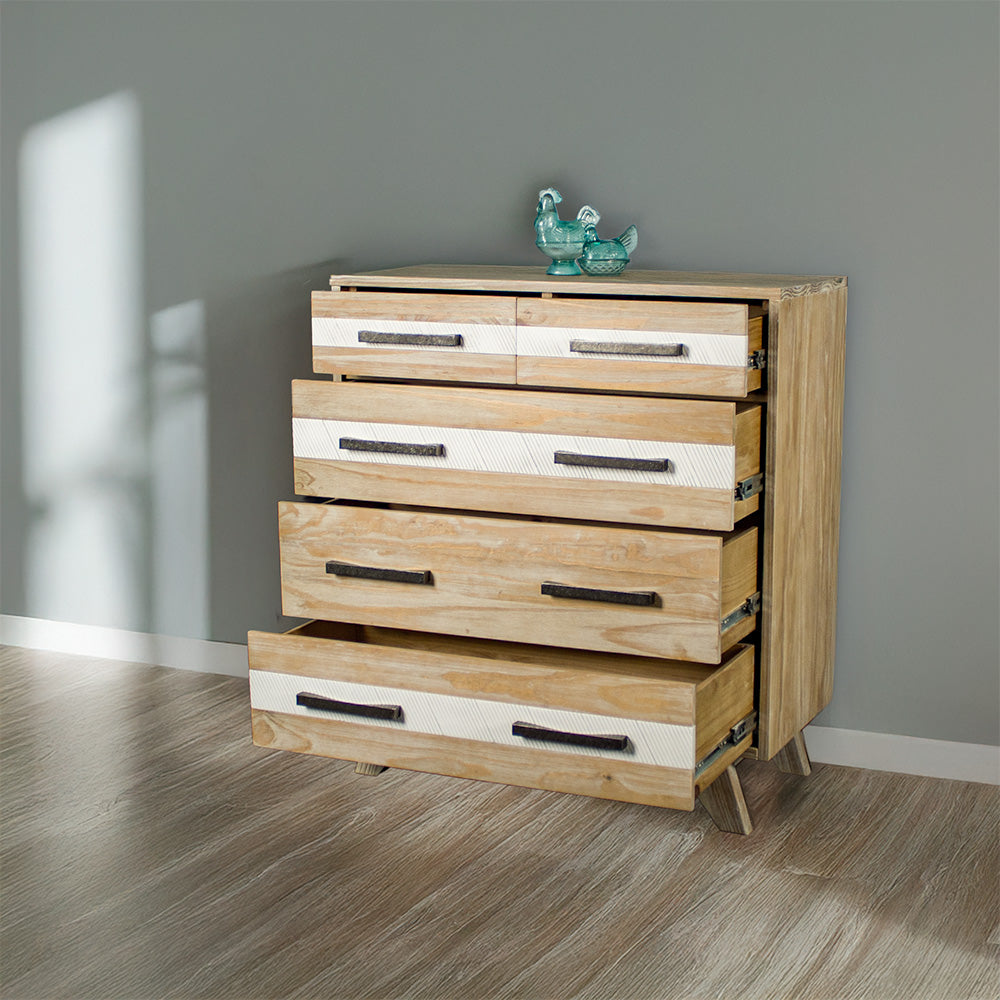 The front of the Soho 5 Drawer Tallboy with its drawers open. There are two blue glass ornaments on top.