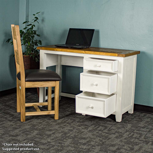 An overall view of the Tuscan Recycled Pine Small Desk with its drawers open. There is a chair in front of the desk and a laptop on top of the desk.