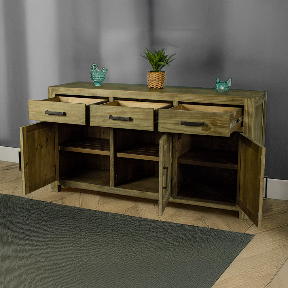 The front of the Vancouver Large NZ Pine Buffet with its drawers and doors open. There are two blue glass ornaments on top with a potted plant in the middle.
