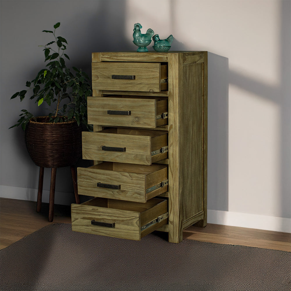 The front of the Vancouver 5 Drawer NZ Pine Lingerie Chest with its drawers open. There are two blue glass ornaments on top and a free standing potted plant next to the lingerie chest.