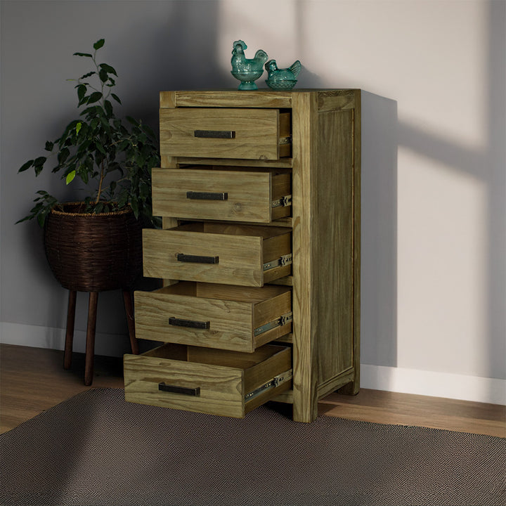 The front of the Vancouver 5 Drawer NZ Pine Lingerie Chest with its drawers open. There are two blue glass ornaments on top and a free standing potted plant next to the lingerie chest.