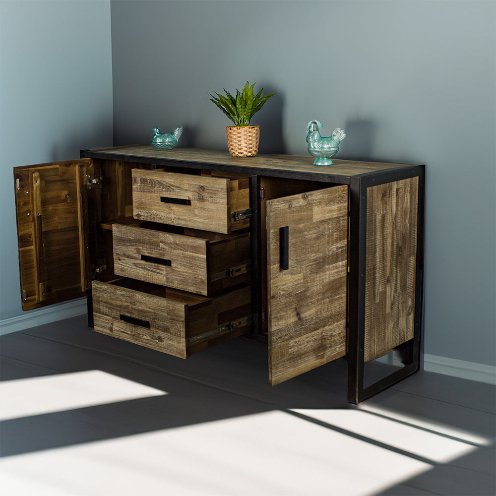 The front of the Victor 2 Door 3 Drawer Sideboard with its doors and drawers open. There are two blue glass ornaments on top with a potted plant in between.