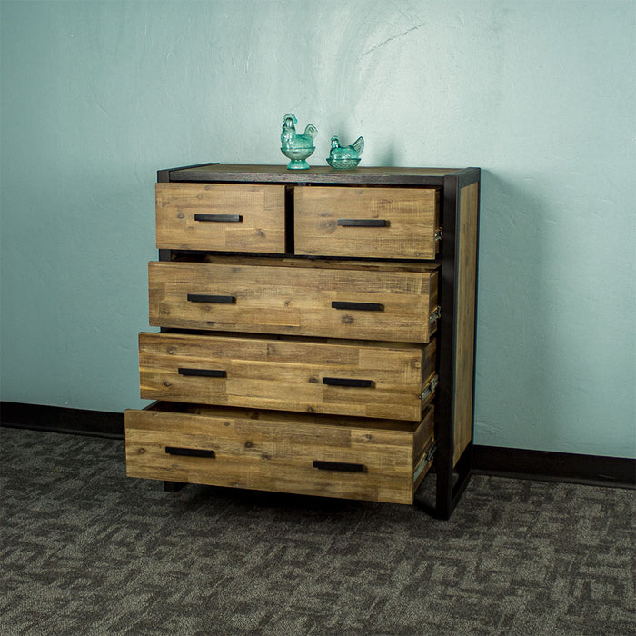 Front of the Victor 5 Drawer Tallboy with its drawers open. There are two blue glass ornaments on top.