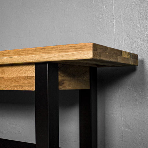 A close up of the side/end of the Golden Gate Oak Bench Seat.