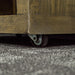 A close up of the wheels on the Stonemill Recycled Pine Cube Shelf, allowing the shelf to be easily moved.