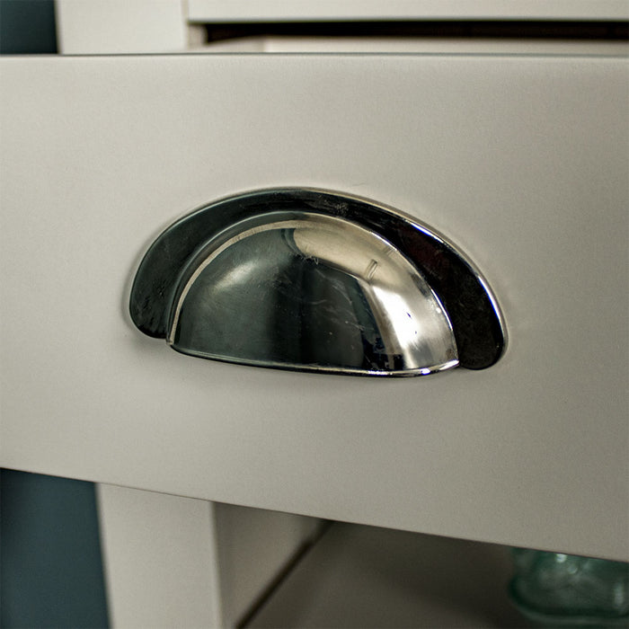 Close up of the silver circular metal chrome handle on the Alton Hall Table with 2 Drawers