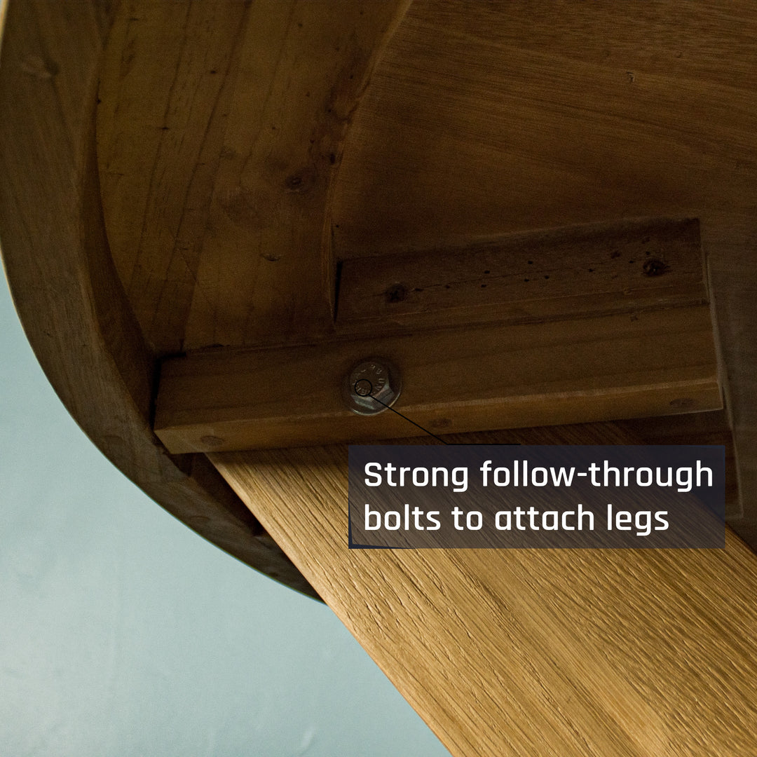 Close up of one of the bolts that secure the legs of the Amstel Round Oak Dining Table