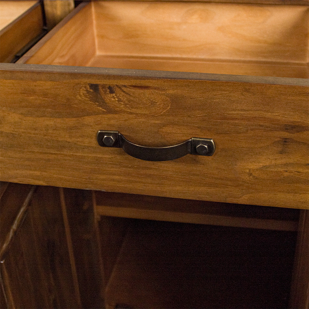 A close up of the Botanica 3-Drawer Large Buffet's drawer handles.