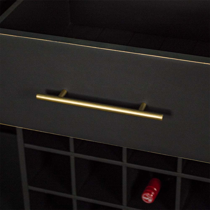 A close up of the gold coloured handle on the drawers on the Cascais Large Buffet with Wine Rack.