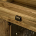 A close up of the brushed golden metal handle on the Danube Compact Granite Top Oak Kitchen Island