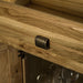 A close up of the brushed golden metal handle on the Danube Compact Granite Top Oak Kitchen Island