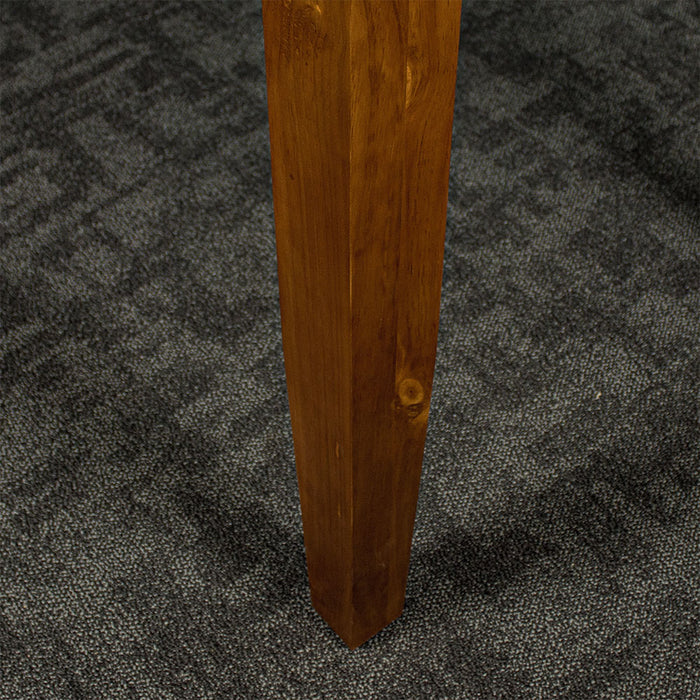 A close up of the leg of the Hamilton Dining Table with Rimu Finish (1200mm)