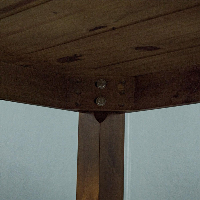 A close up of the bolts that securely hold the legs to the Hamilton Rimu Stained Dining Table (1500mm)
