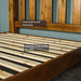 View of the raw wooden slats on the Rimu stained Jamaica King Size Slat Bed Frame
