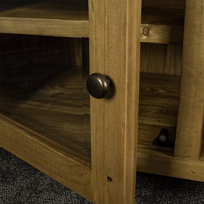 A close up of the handle on the door of the Ventura Recycled Pine Medium TV Unit . The magnet latch can also be seen