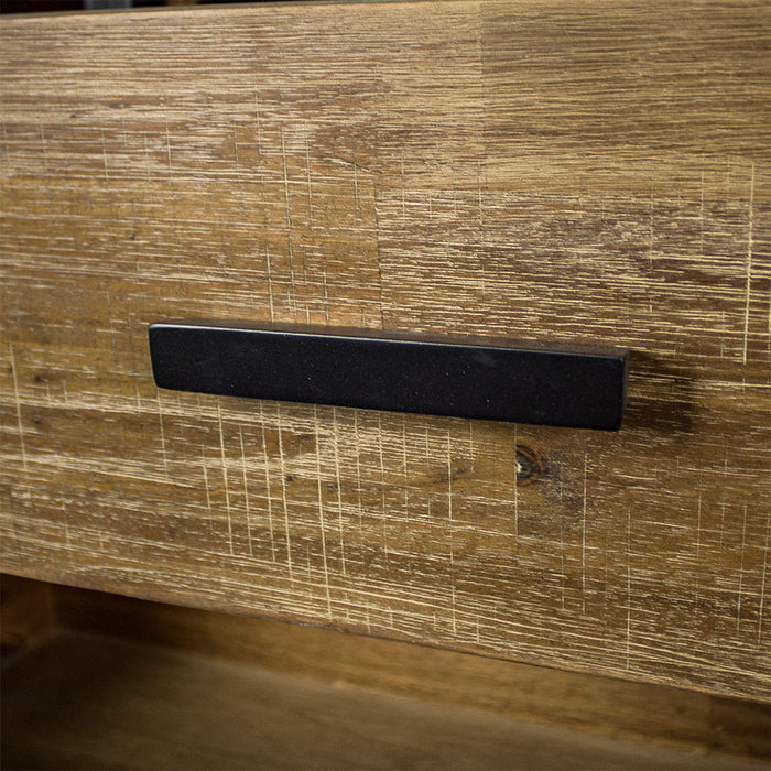 Close up of the black wooden handle on the Victor 7 Drawer Lowboy